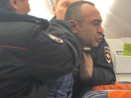 Sərxoş azərbaycanlı təyyarədə dava saldı - FOTO