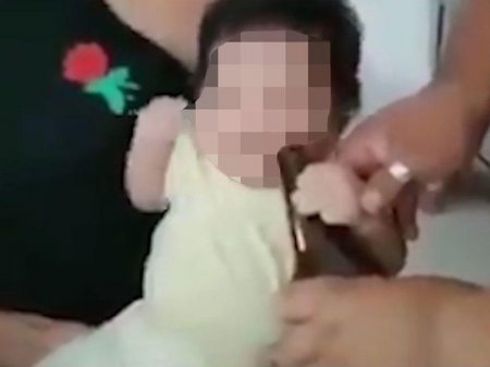 Kişi 4 aylıq körpəyə pivə içirtdi, qəhqəhə çəkdi - FOTO